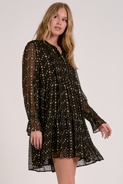 V-NECK BOTTOM RUFFLE DRESS IN BLACK GEO PRINT SIDE VIEW