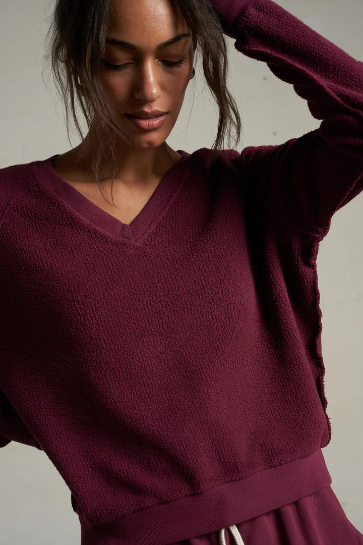 ZURI REVERSE FLEECE V-NECK SWEATSHIRT IN DARK BURGUNDY FRONT VIEW