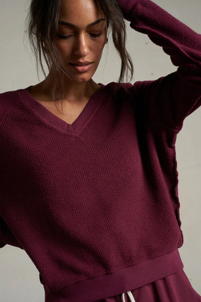 ZURI REVERSE FLEECE V-NECK SWEATSHIRT IN DARK BURGUNDY FRONT VIEW