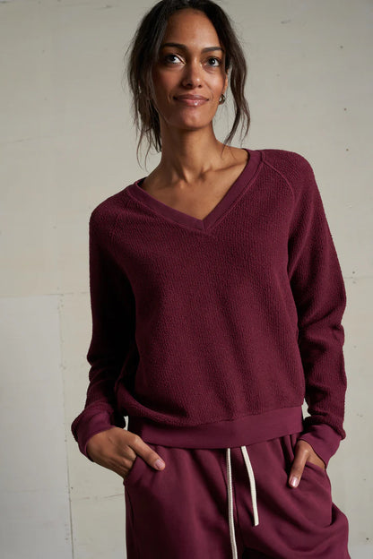 ZURI REVERSE FLEECE V-NECK SWEATSHIRT IN DARK BURGUNDY FRONT VIEW