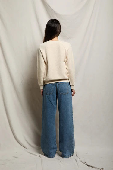 Sugar cream Ziggy fleece crew from the back with 3/4 sleeves and ribbed hem