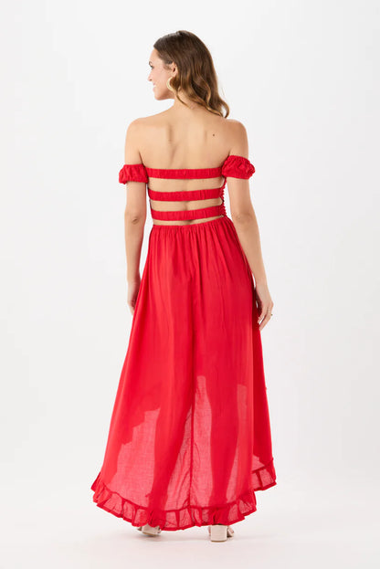 Red off-shoulder maxi dress with crisscross back straps and tiered hem