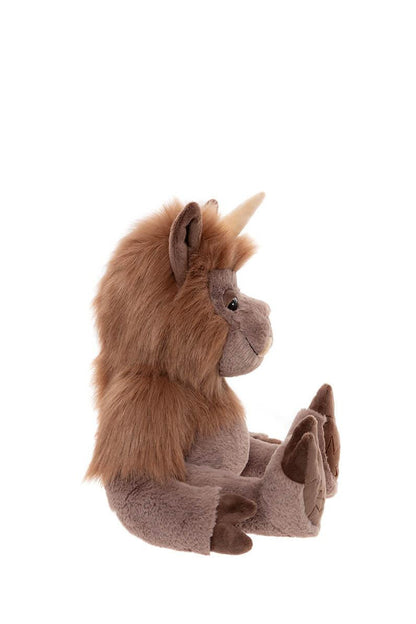 Plush toy quarry  with brown fur and a white horn on a white background