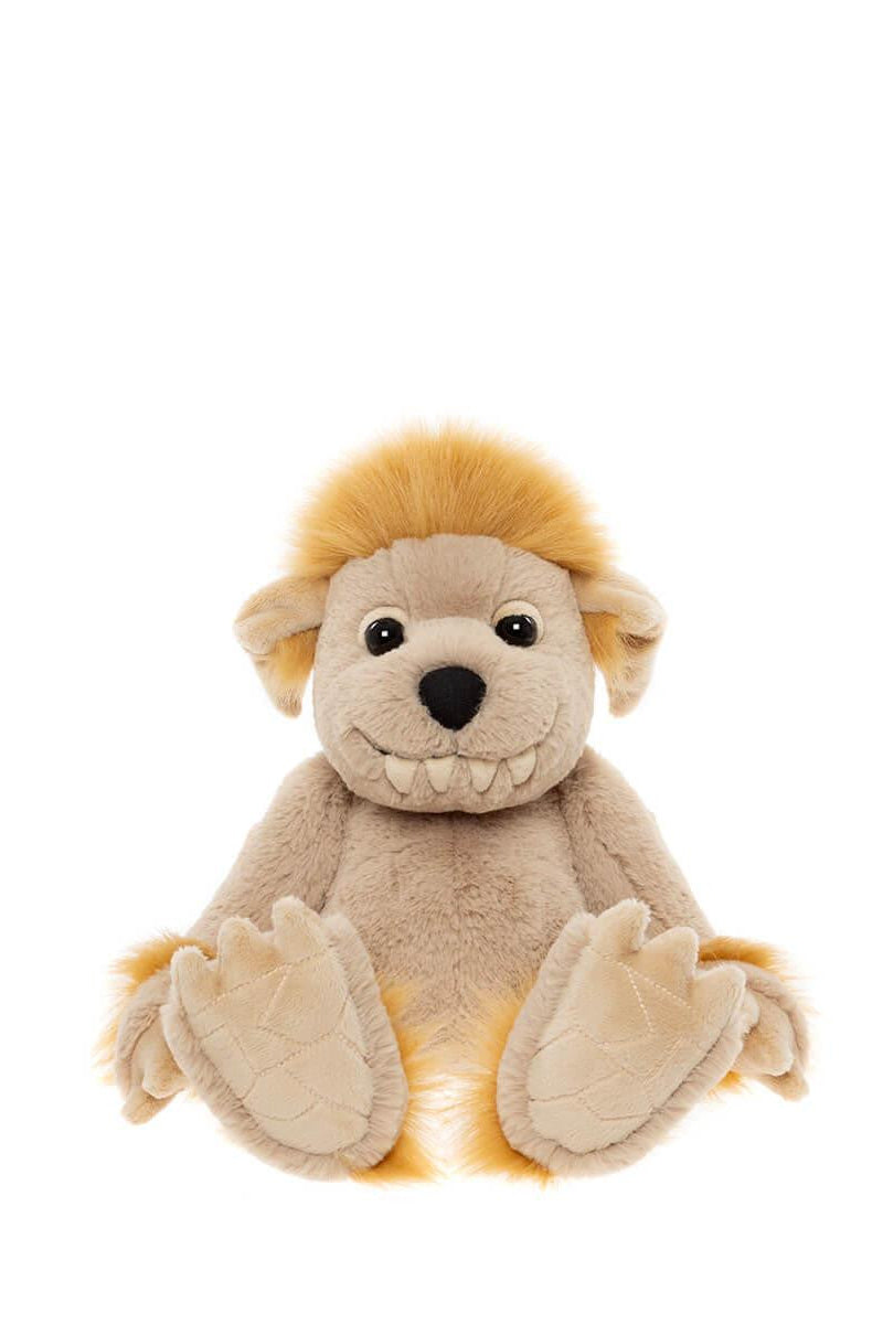 Plush bedrock toy on a white background