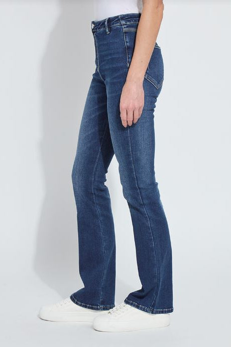 Dark blue flare denim jeans with side seam detail and long hem