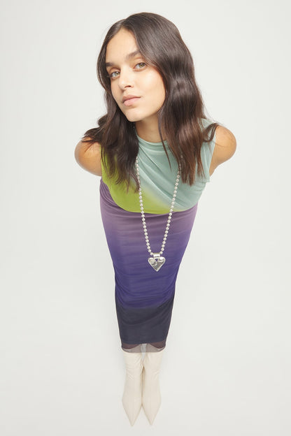 Long ball-chain necklace with heart pendant worn on model