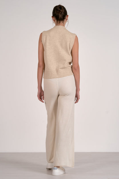 SLEEVELESS ZIP SWEATER IN SAND BACK VIEW