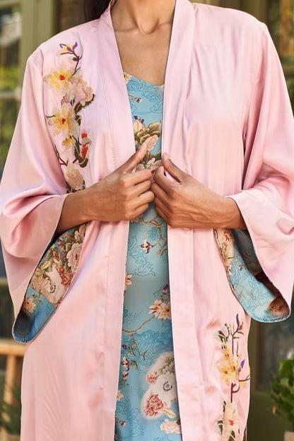 Reversible duster with tie in Taisay pink side closeup front view