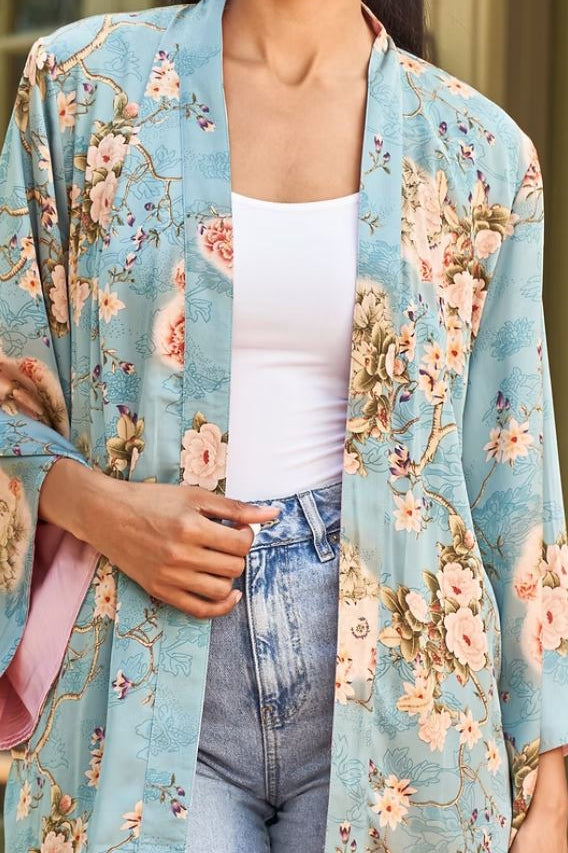 Reversible duster with tie in Taisay blue side closeup front view