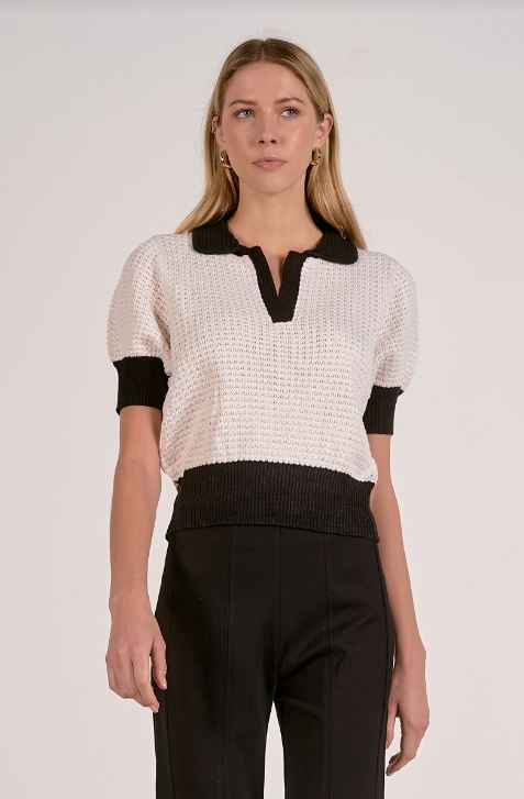 3/4 sleeve off white and black sweater front view