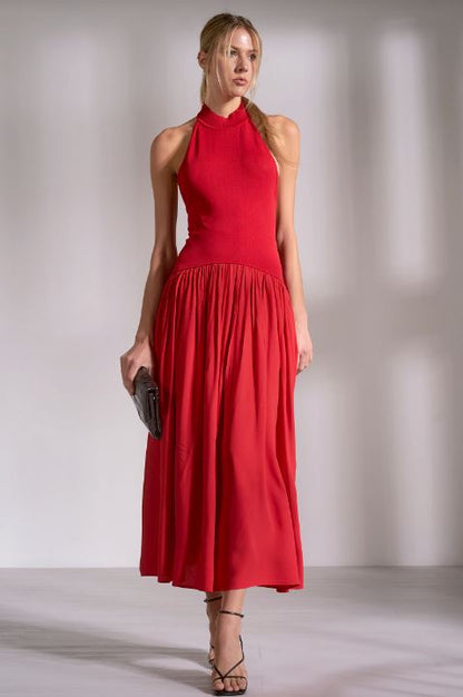 Red sleeveless high-neck maxi sweater dress with gathered waist and pleated skirt