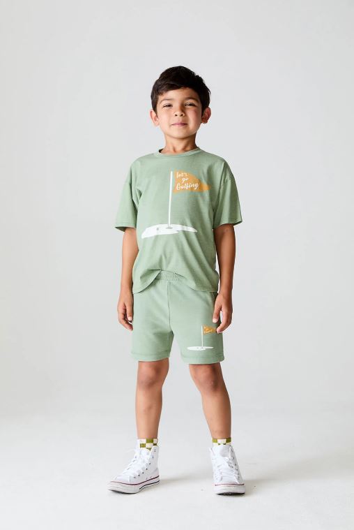 Let's go golfing shorts in leafy green front view