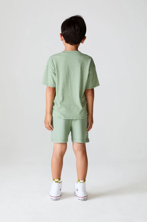 Let's go golfing shorts in leafy green back view