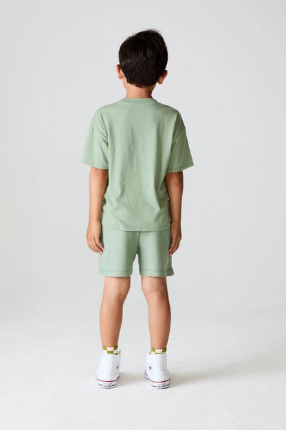 Let's go golfing shorts in leafy green back view