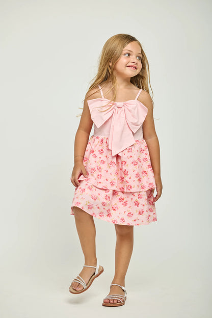 Petal bow ruffle dress in pink front view