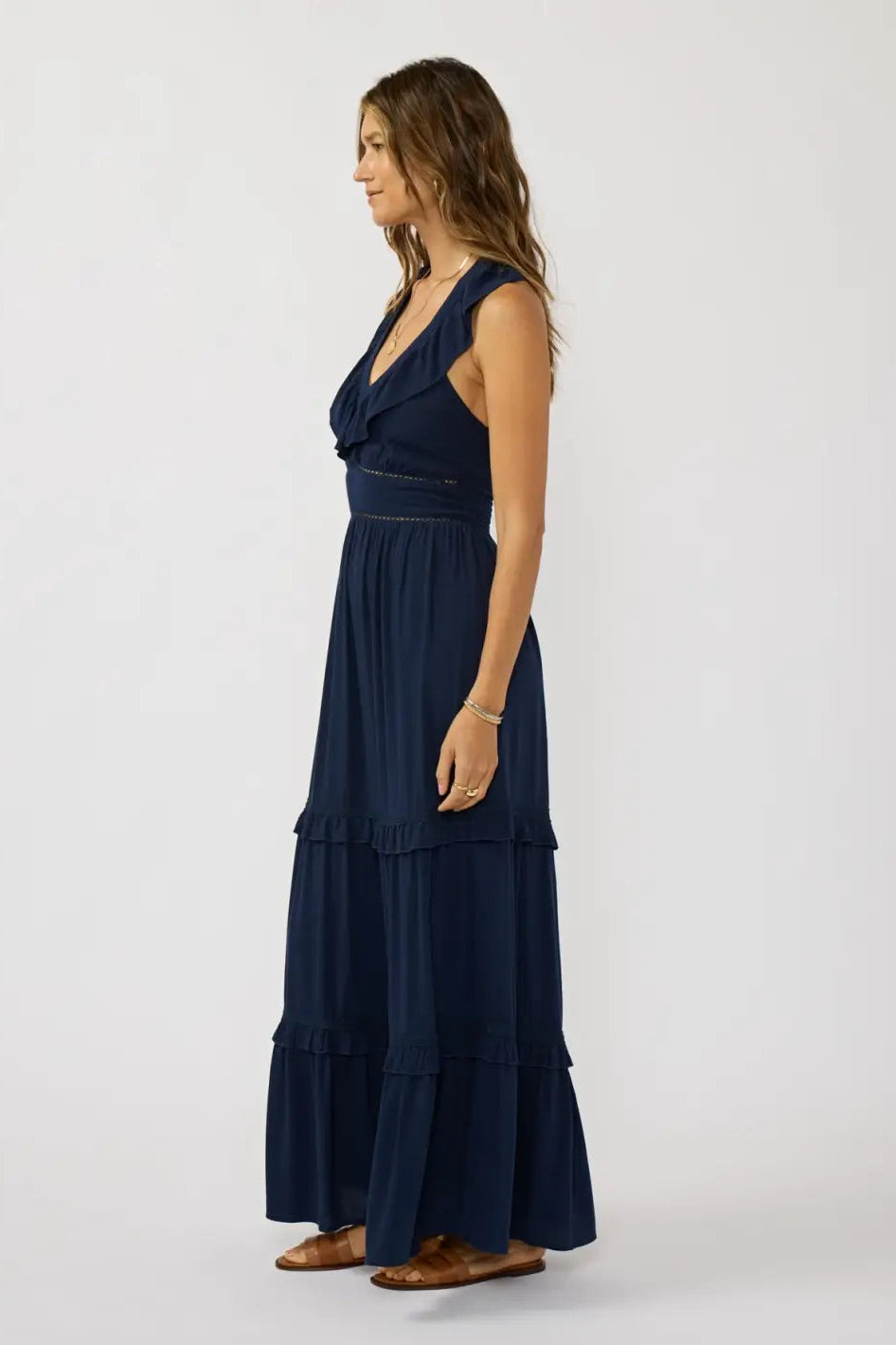 Navy v-neck tiered maxi dress with lace-trimmed ruffle hem and sleeveless bodice
