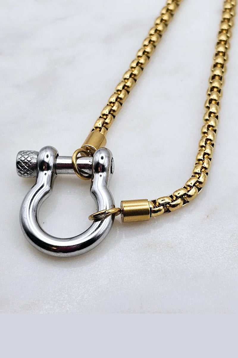 Two-tone horseshoe necklace with gold-tone chain and silver-tone horseshoe clasp