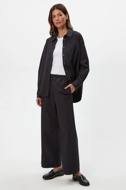TAYLOR black elastic waist wide-leg pants with front pockets.