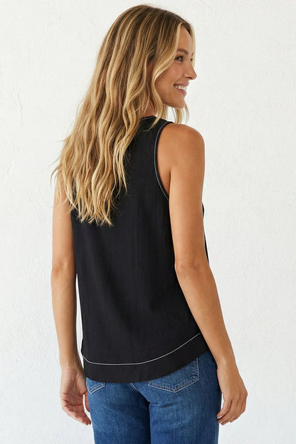 Black contrast-stitched sleeveless top side view with curved seam at hem