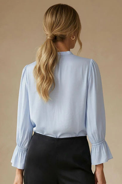 Vneck blouse with flared cuffs in halogen blue back view