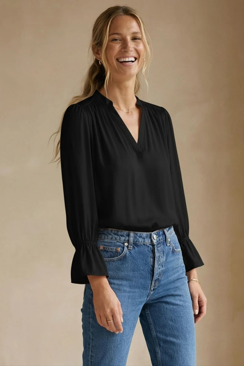 Black V-neck blouse with flared cuffs and long sleeves