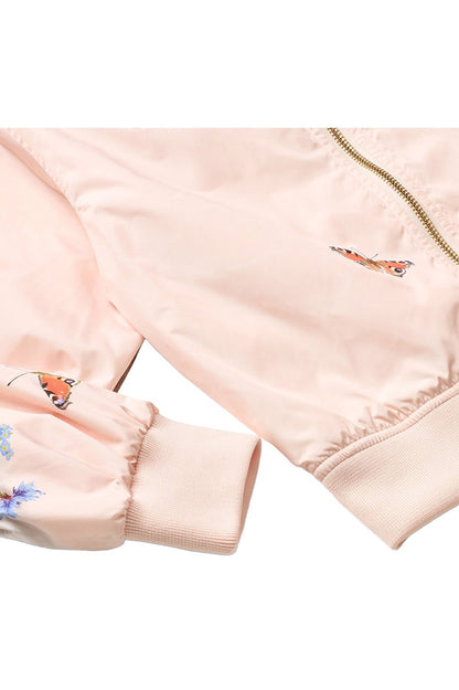 Pale pink bomber jacket sleeve with ribbed cuff and butterfly print
