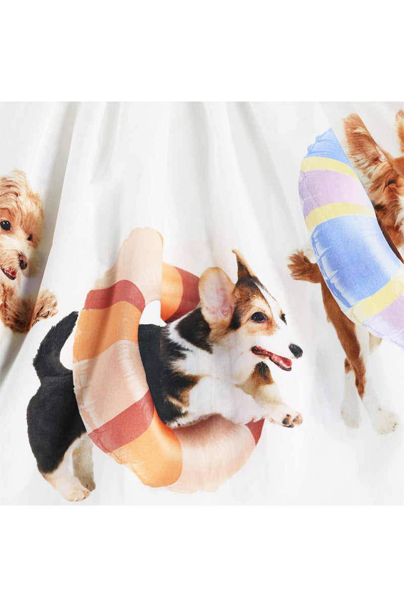 White gathered skirt with close-up puppy faces and pastel color patches