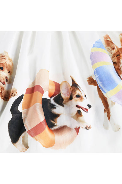 White gathered skirt with close-up puppy faces and pastel color patches
