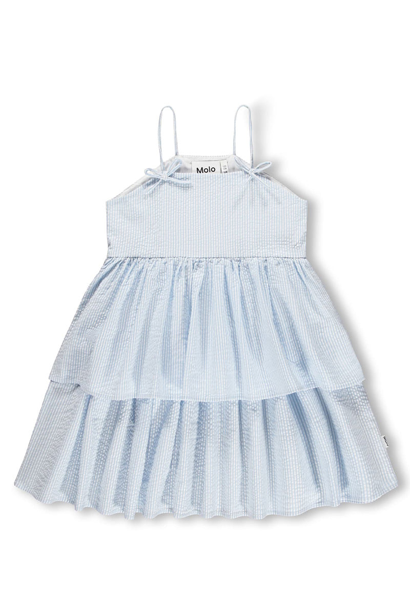 Light blue tiered Chelsea dress with spaghetti straps, gathered yoke, and bow ties