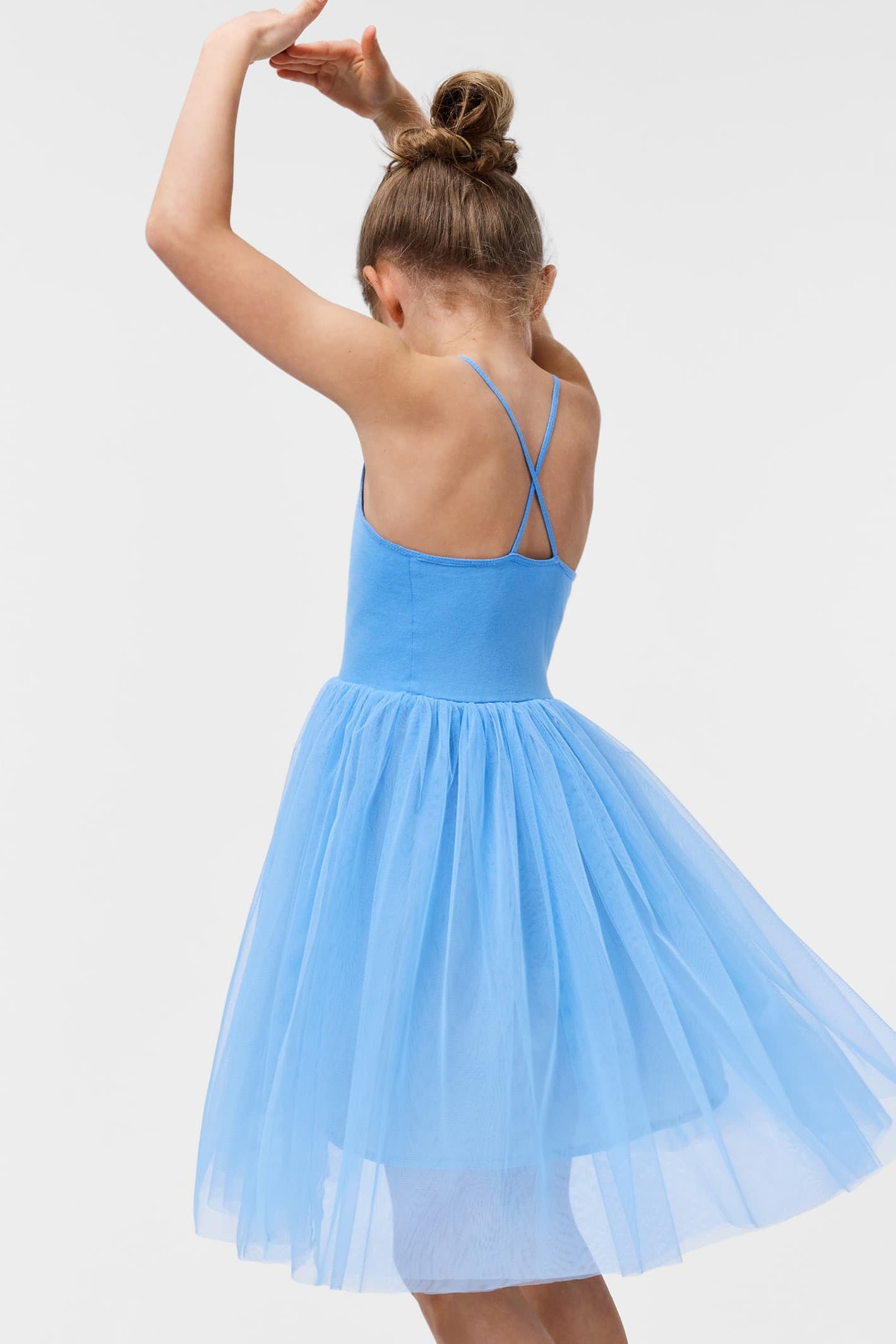 Girls light blue sleeveless tulle dress with crisscross back straps