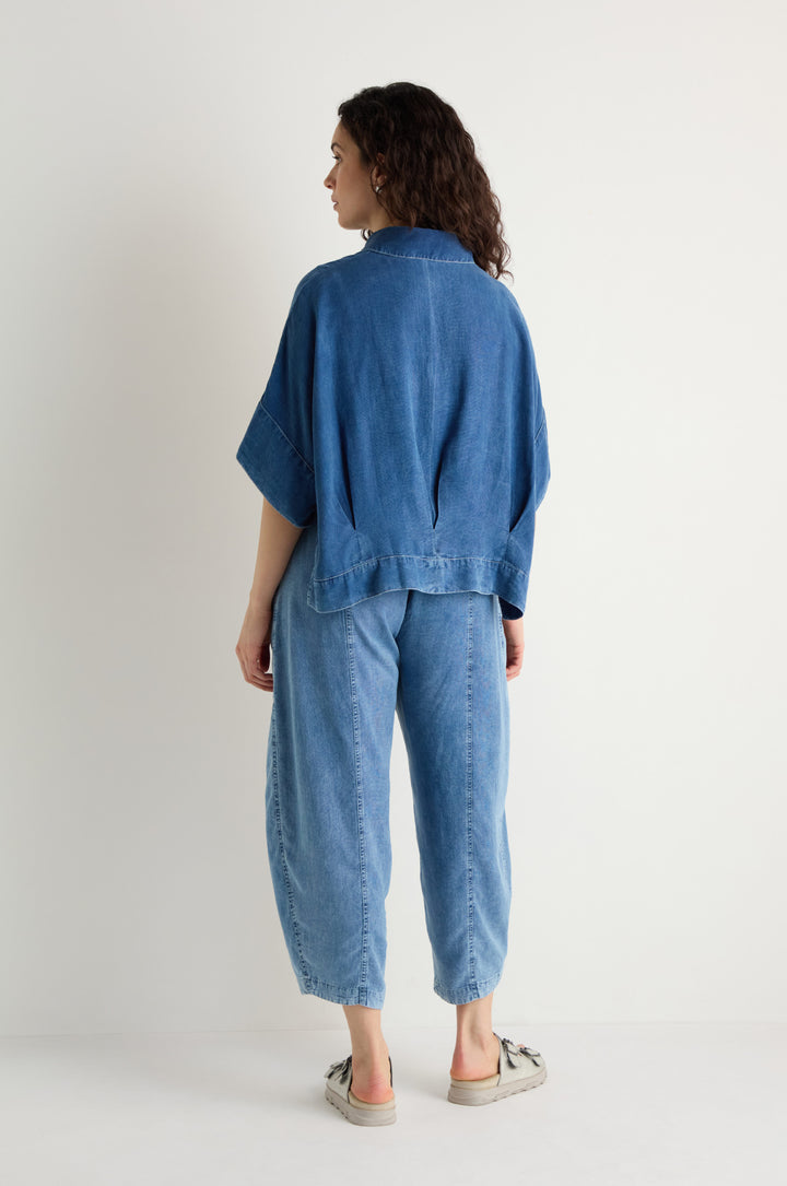Blue denim short-sleeve blouse, back view, relaxed fit