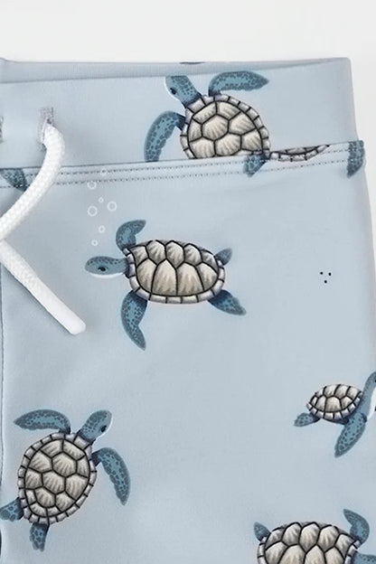 Long sleeve sea turtle rashguard set in navy detail view
