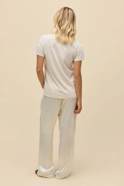 Dirty white graphic crewneck tee, back view with plain fabric