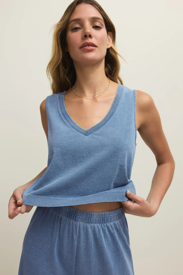 Blue denim V-neck tank top with layered look and draped hem