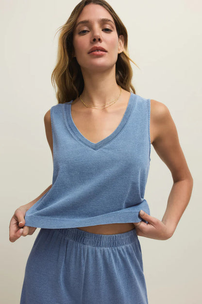 Blue denim V-neck tank top with layered look and draped hem