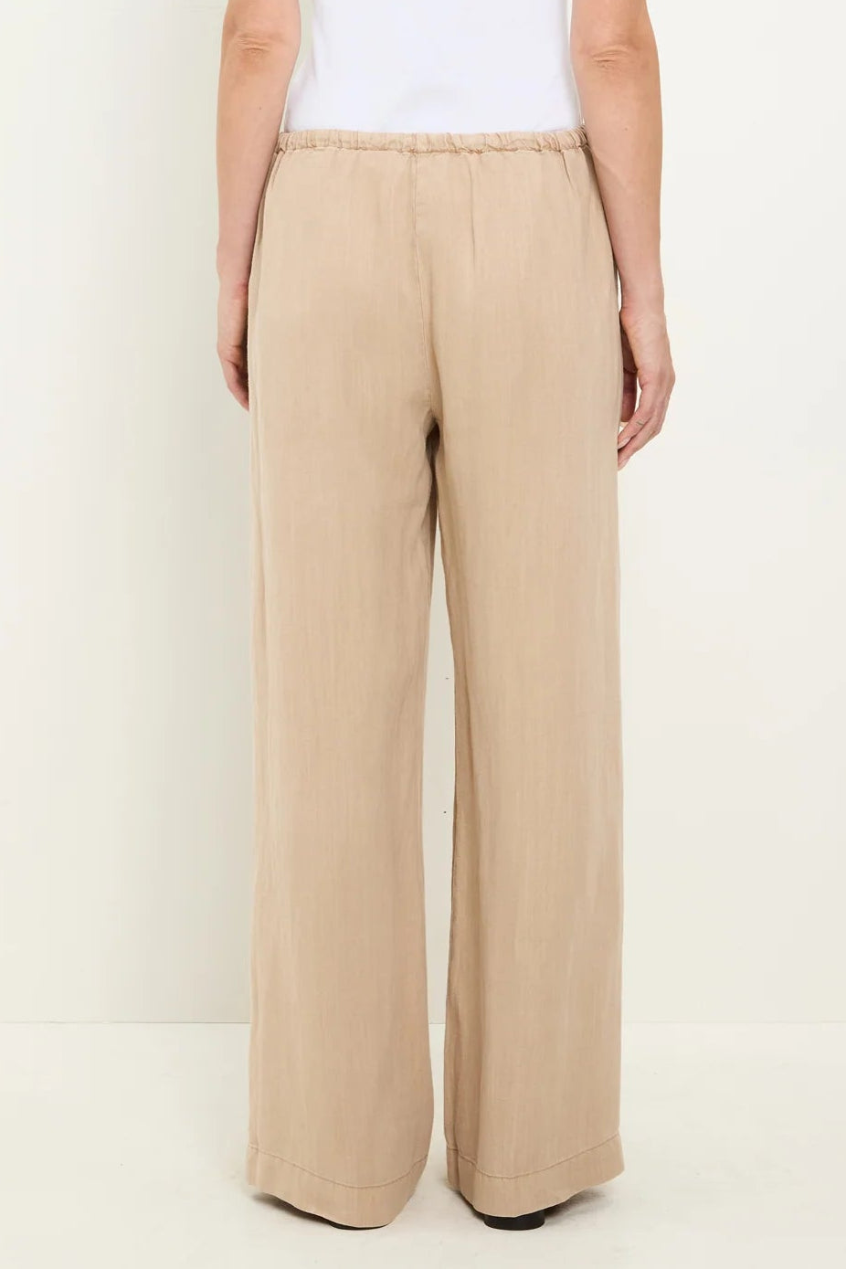 Light beige wide-leg drawstring pants with elastic waistband