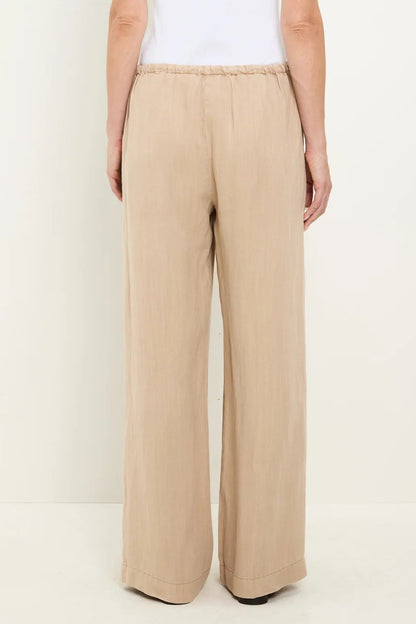 Light beige wide-leg drawstring pants with elastic waistband