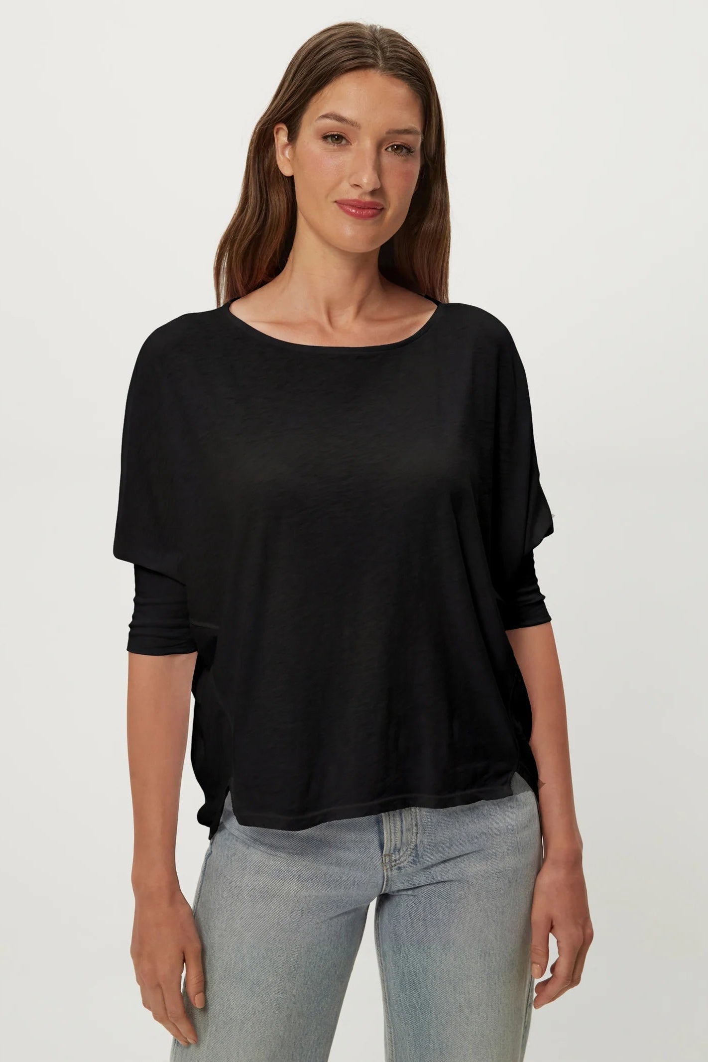 Black dolman tee with crew neck, short sleeves, draped fit