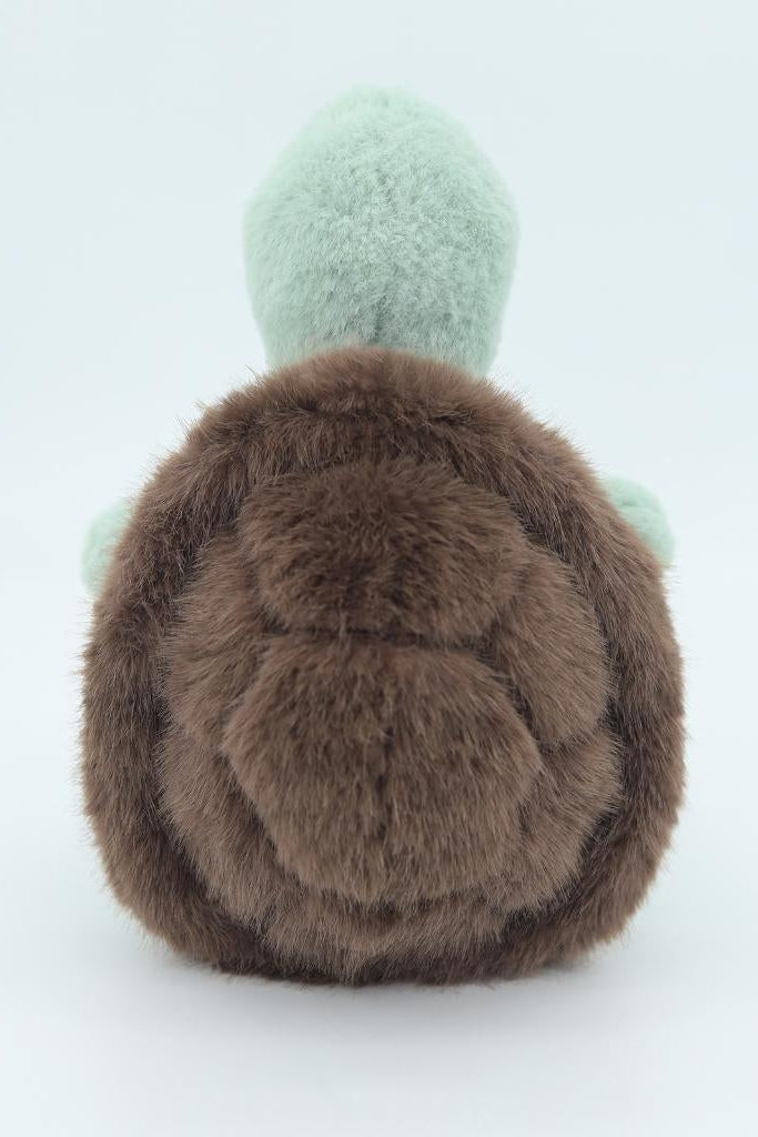 Green plush sea turtle with brown back and rounded rear side
