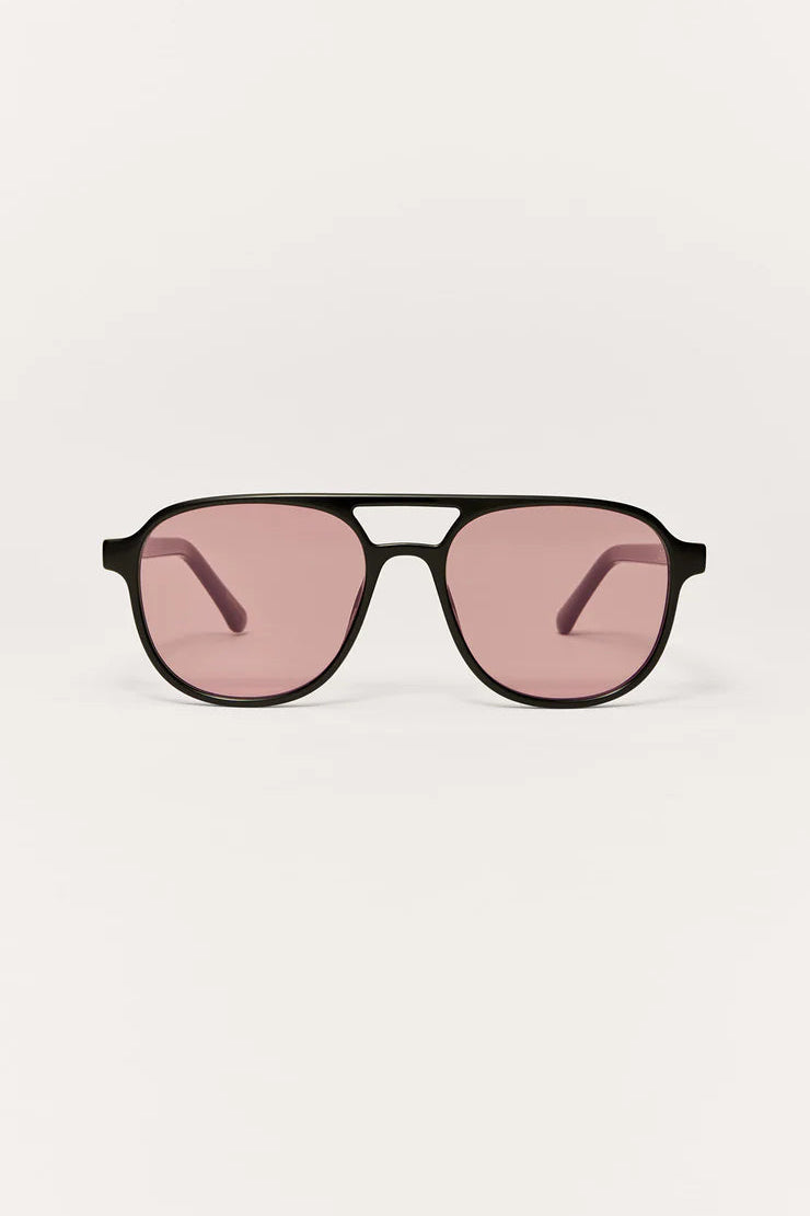 TOURIST SUNGLASSES IN POLISHED BLACK/PINK POLARIZED FRONT VIEW