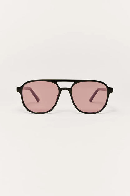 TOURIST SUNGLASSES IN POLISHED BLACK/PINK POLARIZED FRONT VIEW