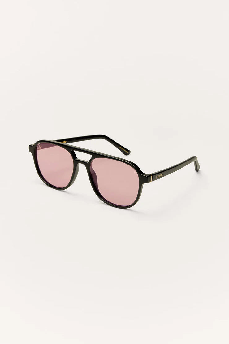 TOURIST SUNGLASSES IN POLISHED BLACK/PINK POLARIZED SIDE VIEW
