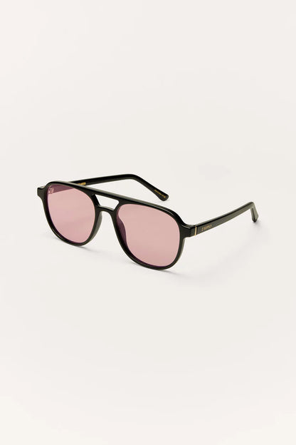 TOURIST SUNGLASSES IN POLISHED BLACK/PINK POLARIZED SIDE VIEW