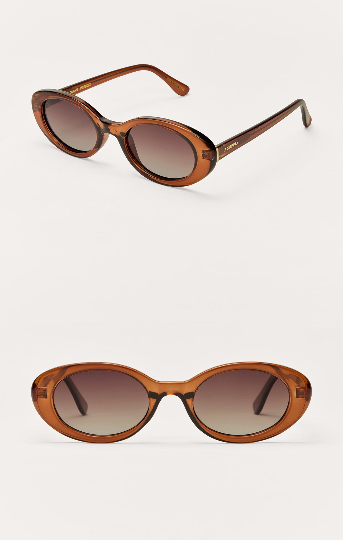 Brown oval sunglasses with dark lenses