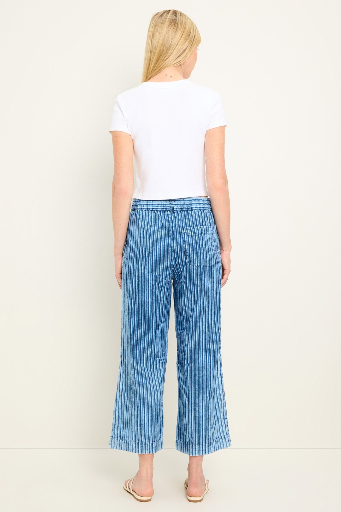 Cody cropped stripe pants, indigo blue vertical stripes, back view