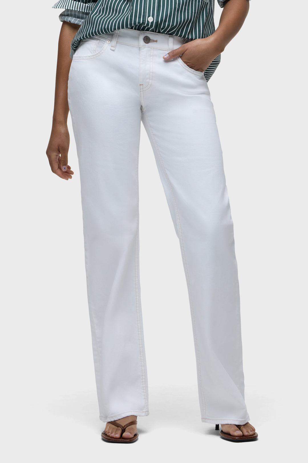 White low-rise loose straight pants with button-front and front pockets