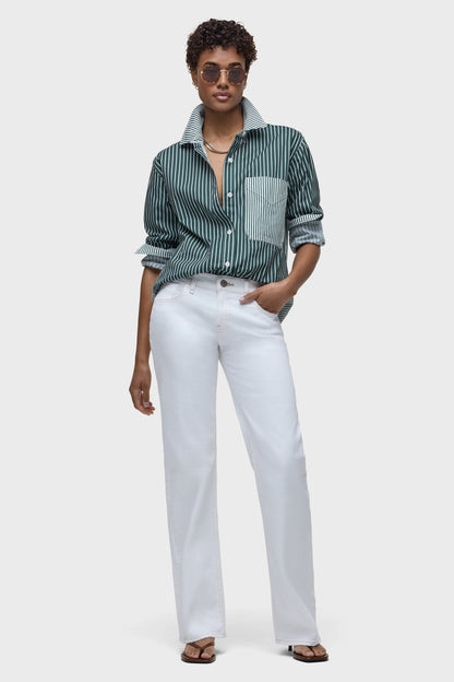 White low-rise loose straight pants with button-front and wide straight legs