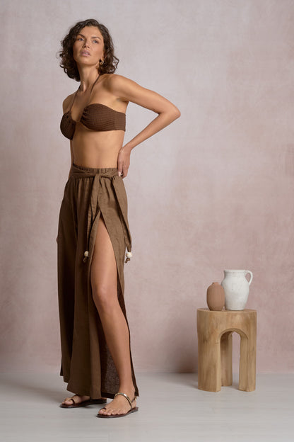 Brown slit side pant with long side slit and gathered tie waist.