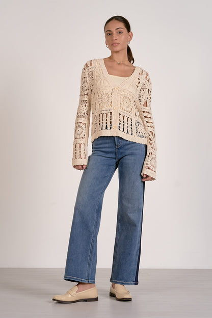 Natural open-knit cardigan sweater with wide scoop neck and long sleeves, crochet openwork