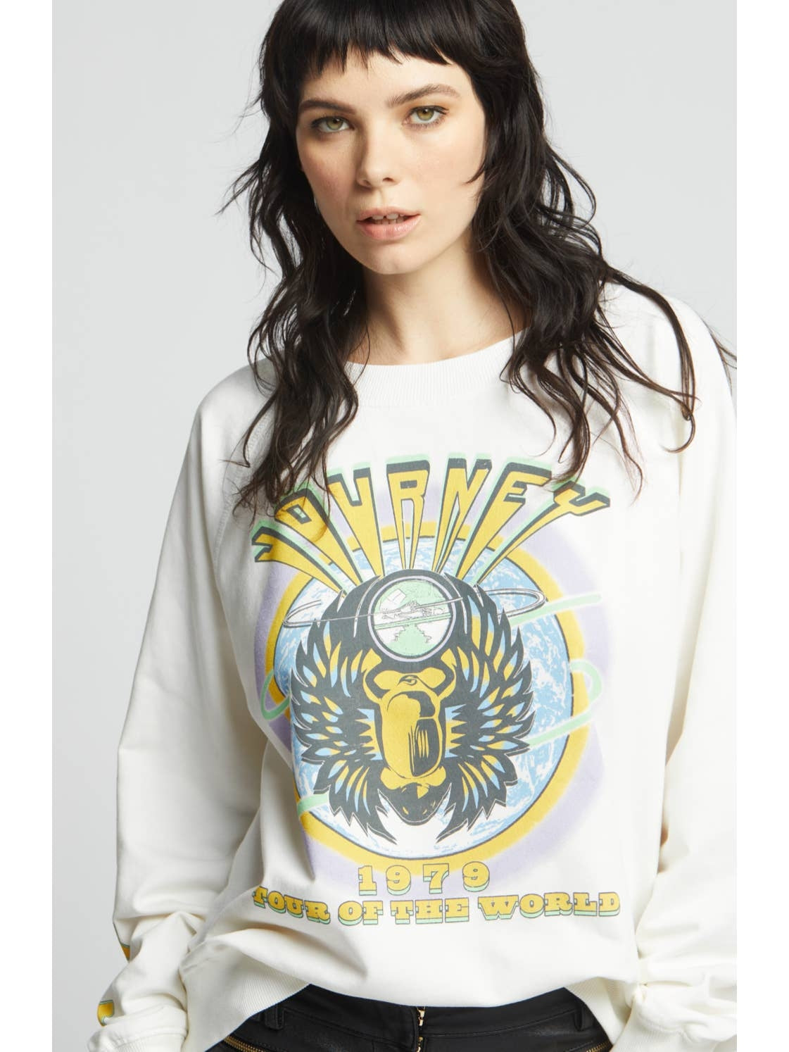 Cream crewneck sweatshirt with large eagle face graphic and colorful '1979' text